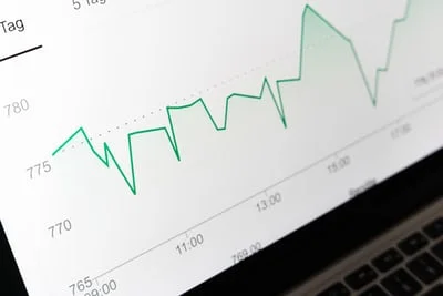 sales graph inflation on laptop screen 